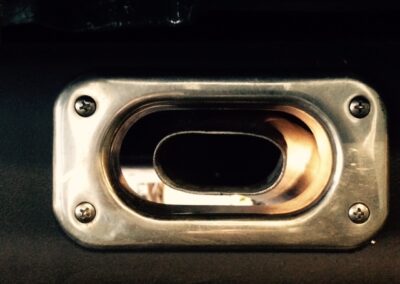Exhaust cutouts on a flathead Ford pickup
